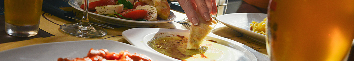 Eating Spanish Tapas Bars Tapas/Small Plates at Bodega on main restaurant in Park City, UT.